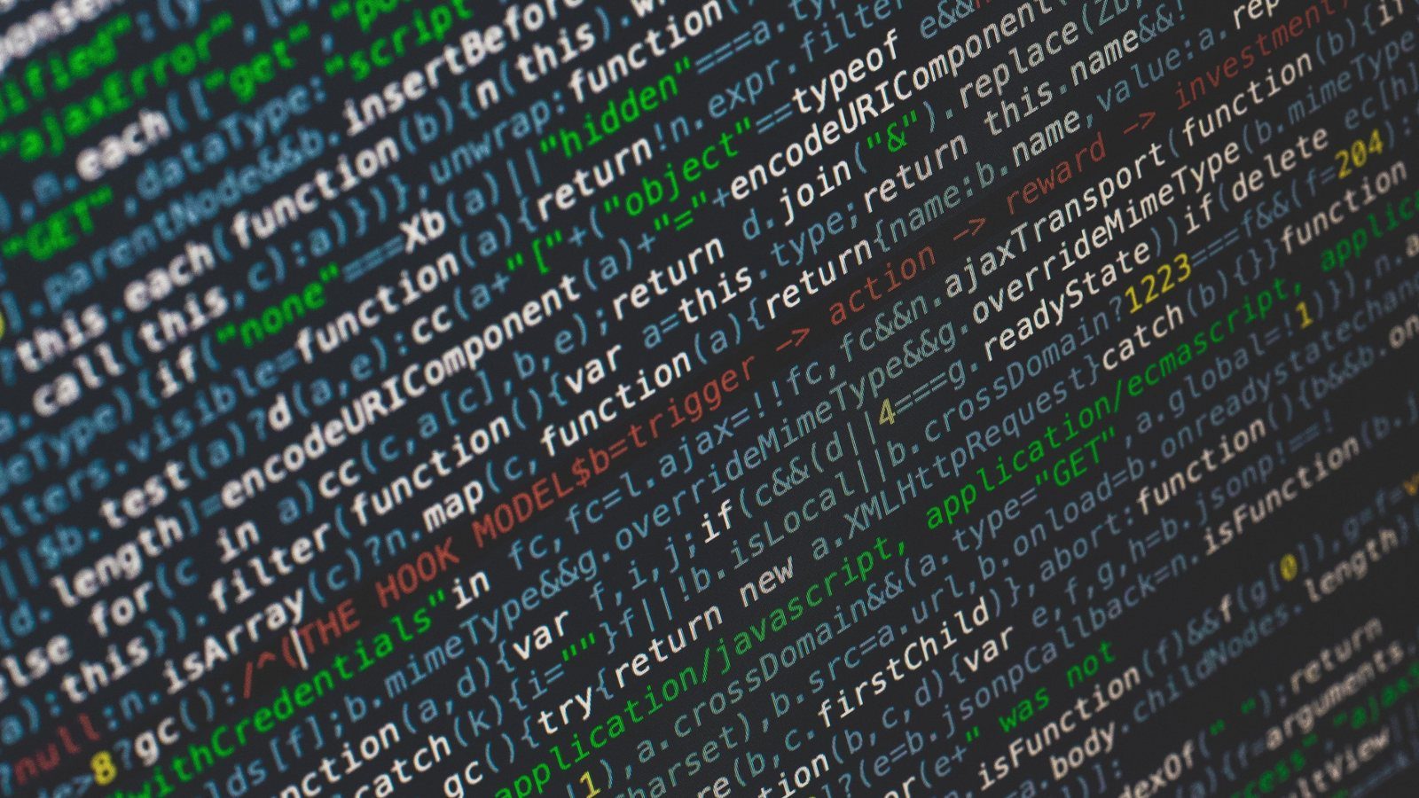Close-up of dense source code on a monitor